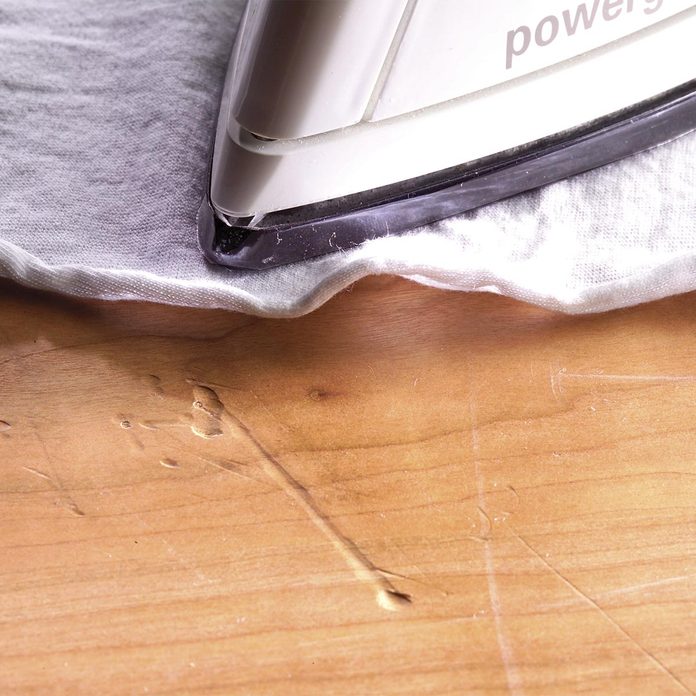 iron dents in wood