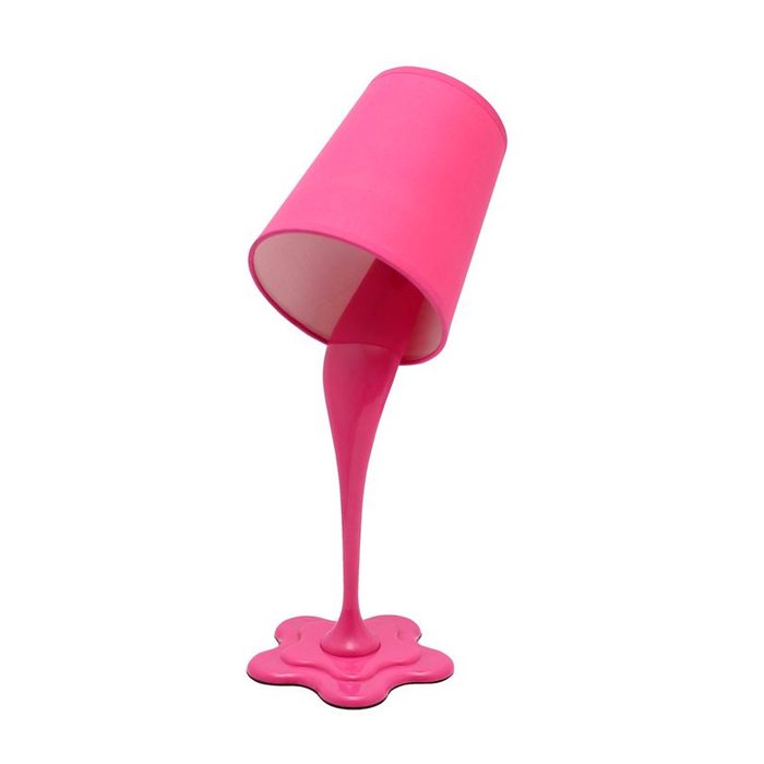 A pink cup is tilted, pouring a thick stream of pink liquid onto a flower-shaped puddle below. The background is plain and white.