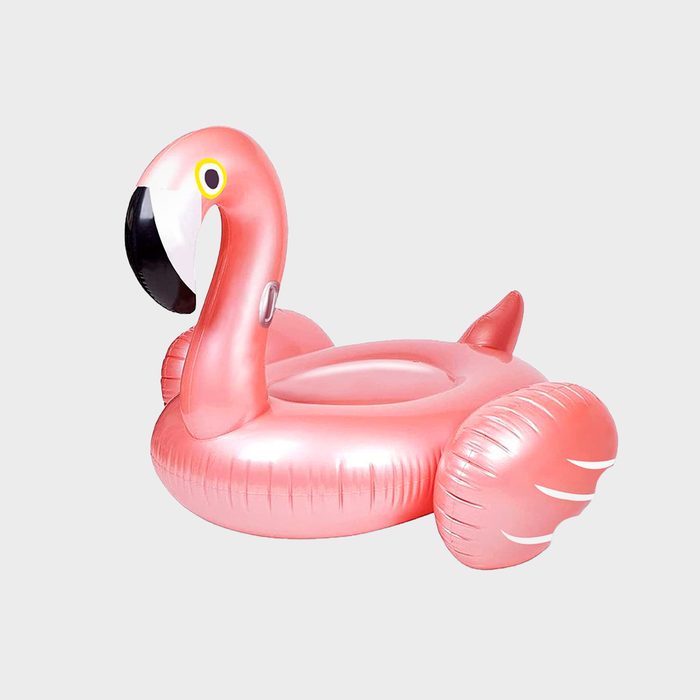 A large, pink inflatable flamingo floats, designed for recreational use, with a rounded body and an elongated neck, set against a neutral background.