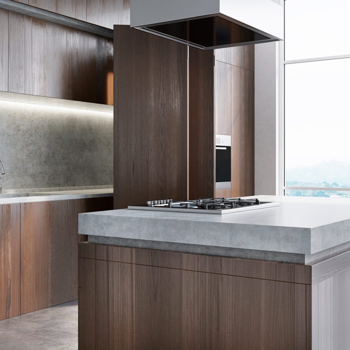 A modern kitchen features a central island with a gas cooktop, surrounded by sleek wooden cabinets and a large window revealing an outdoor view.