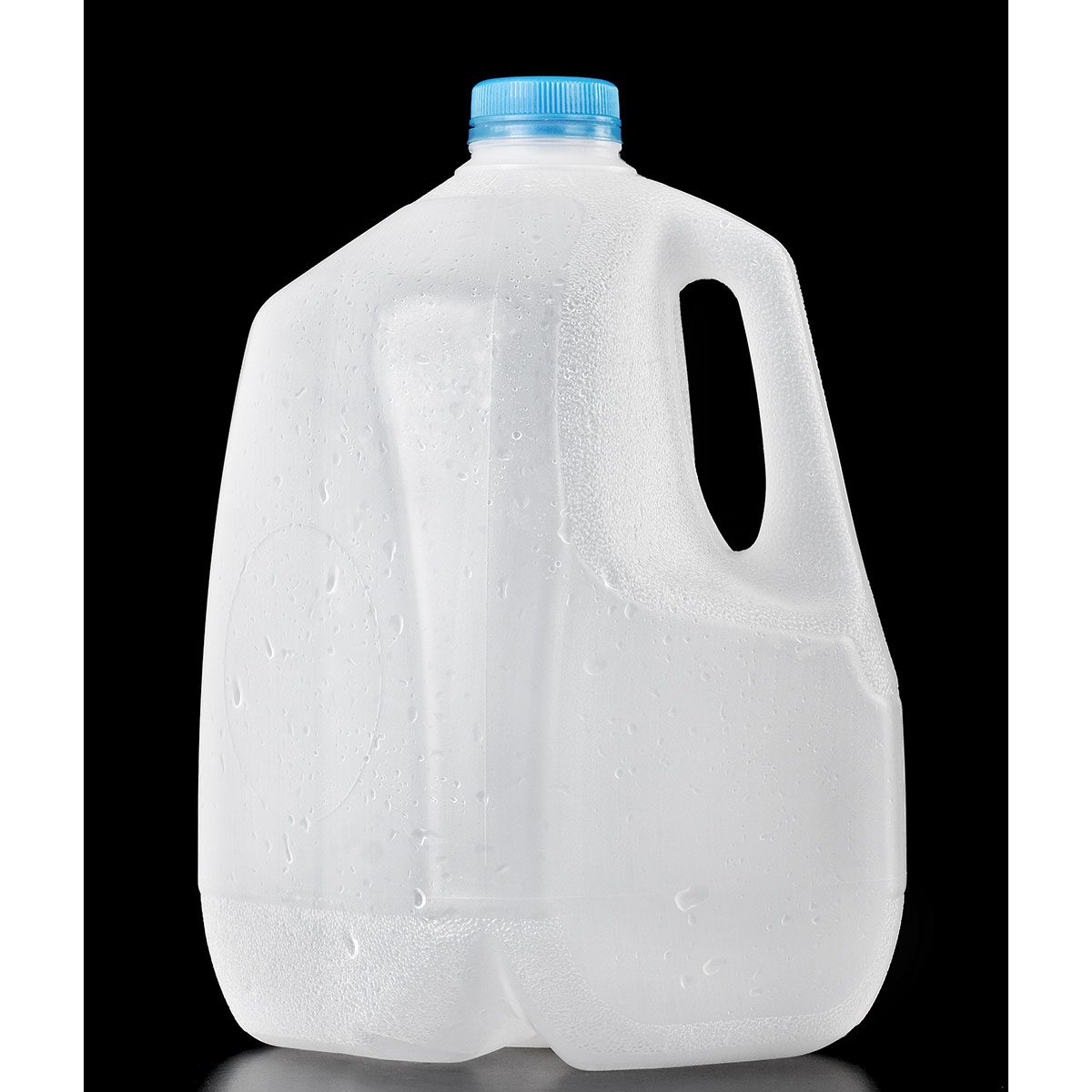 A frosted plastic jug with a blue cap stands upright, covered in droplets, against a black background, suggesting cold liquid inside.