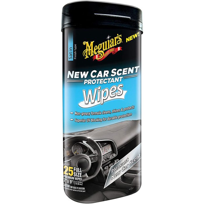 A container of car cleaning wipes is displayed, labeled for protecting surfaces with a 