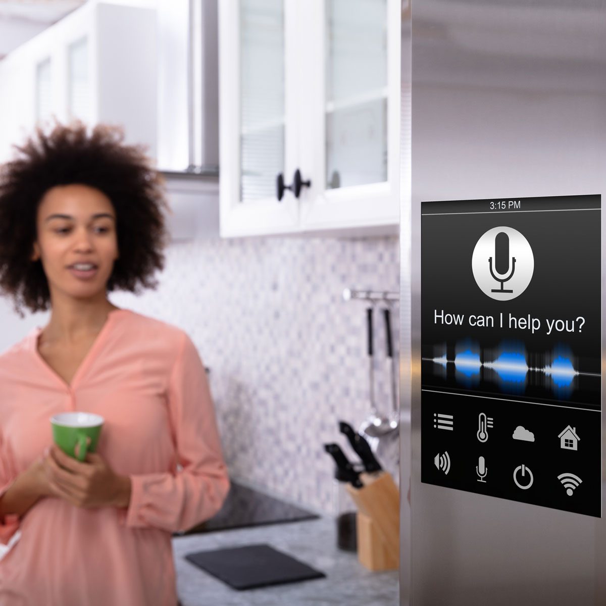 Woman standing by a smart fridge