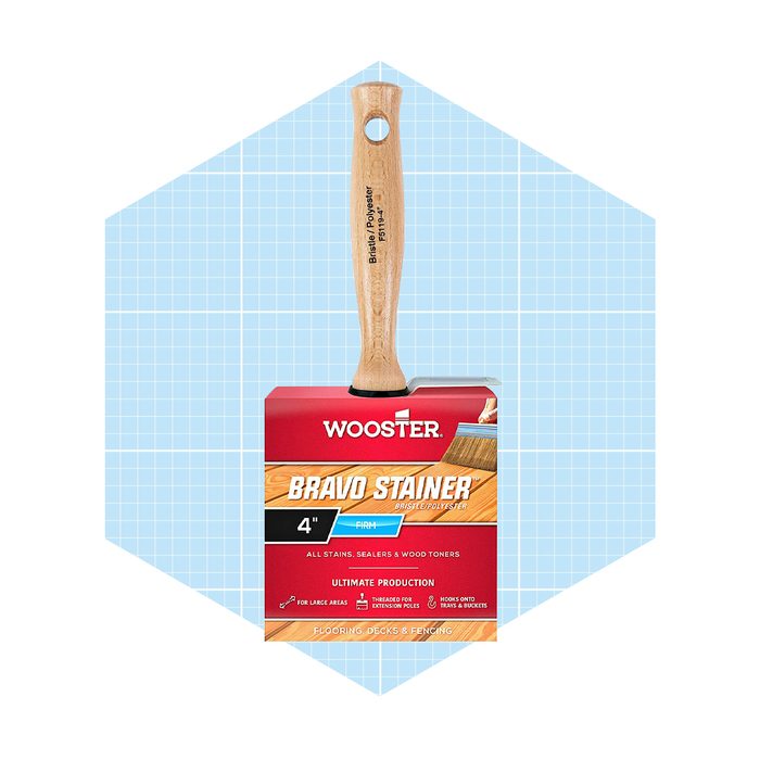 A 4-inch paintbrush with a wooden handle sits on a red and yellow packaging labeled 