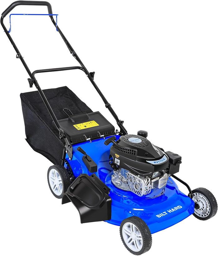 A blue lawn mower sits stationary, featuring a black engine and a grass collection bag. It is positioned on a flat surface, ready for use.