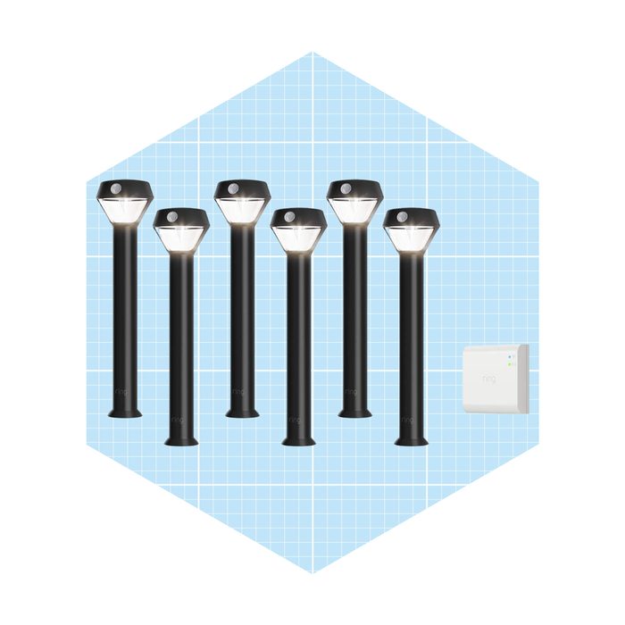Six black outdoor lights stand upright, illuminating. A small white device is positioned nearby against a light blue grid background.