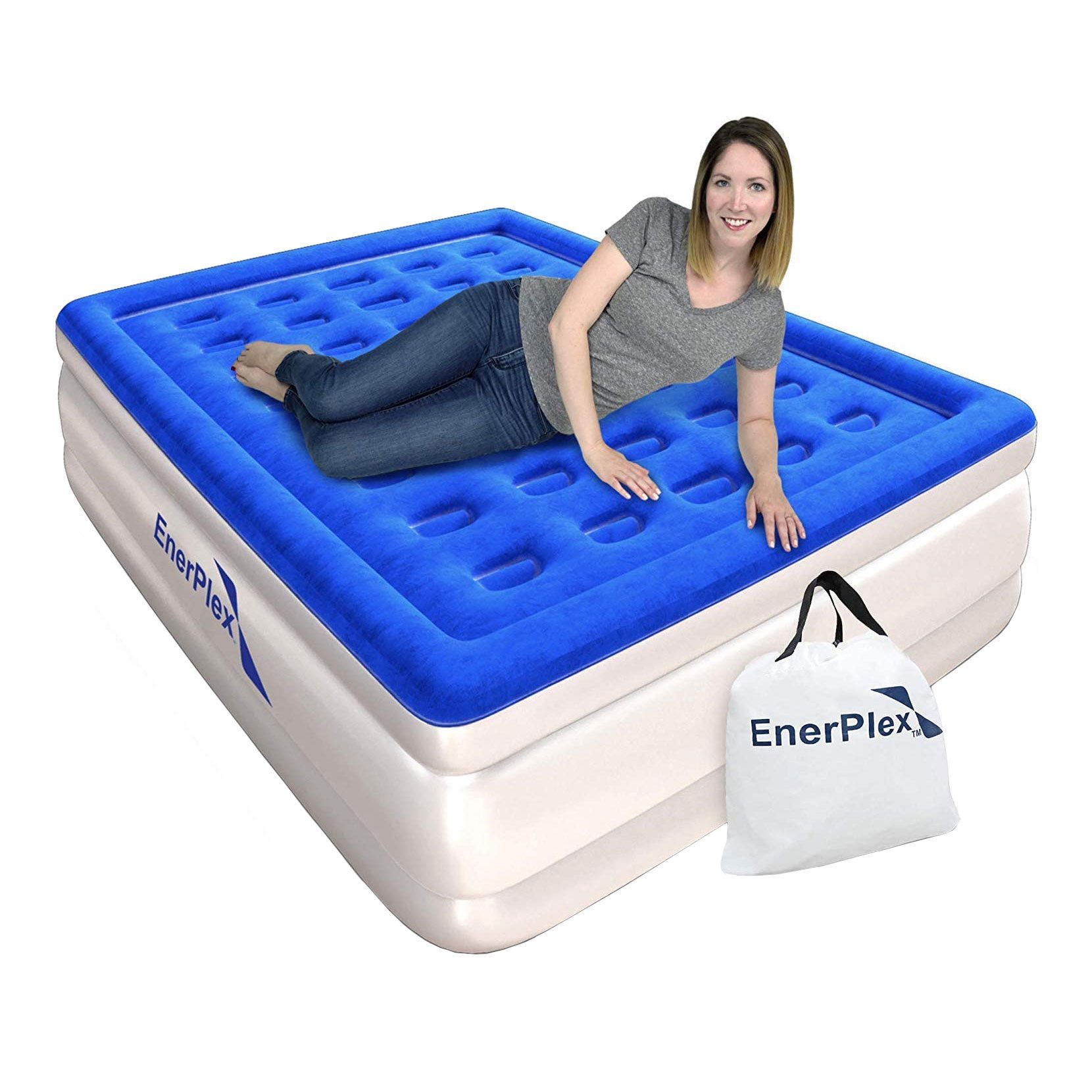 A blue air mattress supports a woman reclining casually on its surface, with a carrying bag nearby, suggesting portable use.
