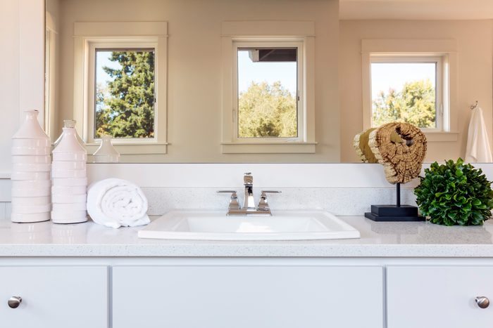 Sink and mirror in bathroom