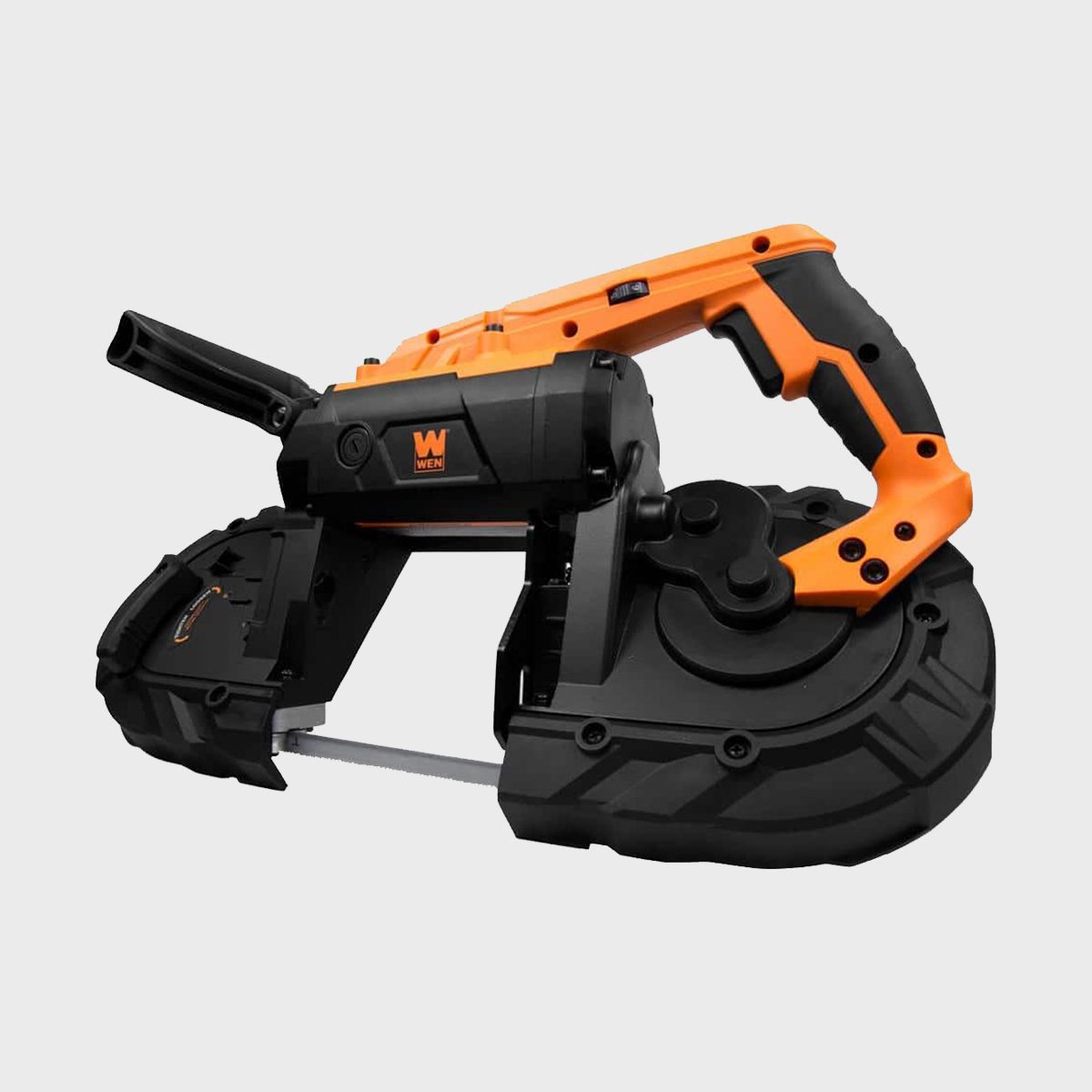 A black and orange portable band saw rests on a neutral background, designed for cutting materials with a blade running between two wheels.