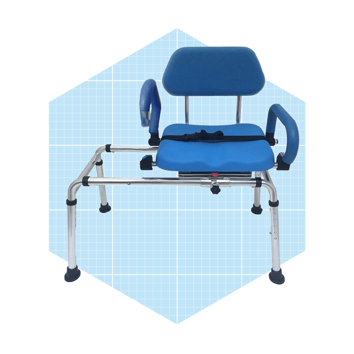 A blue shower chair with armrests securely sits on a grid-patterned light blue background, designed for accessibility and safety during bathing.