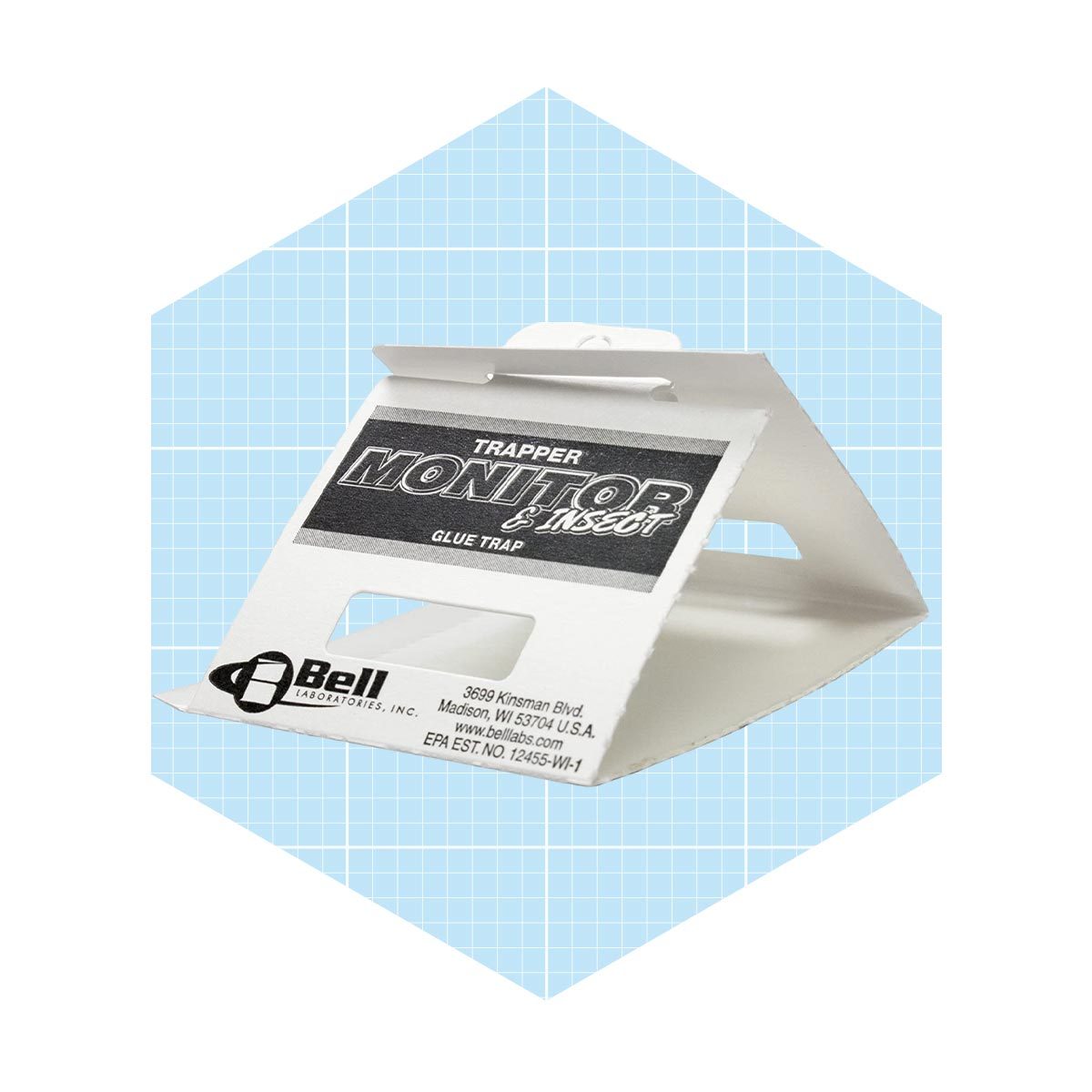 A triangular white glue trap is positioned upright, designed for capturing insects, set against a light blue grid background.