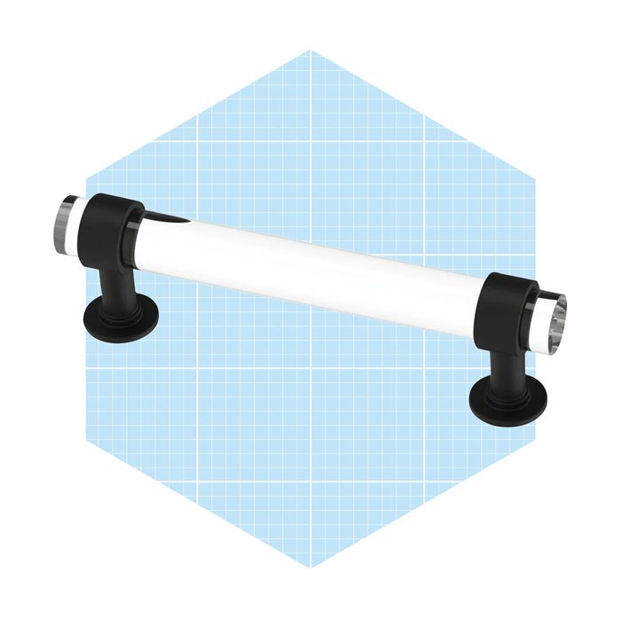A white handrail with black mounts is positioned horizontally, providing support. It is set against a light blue grid background for a clear presentation.