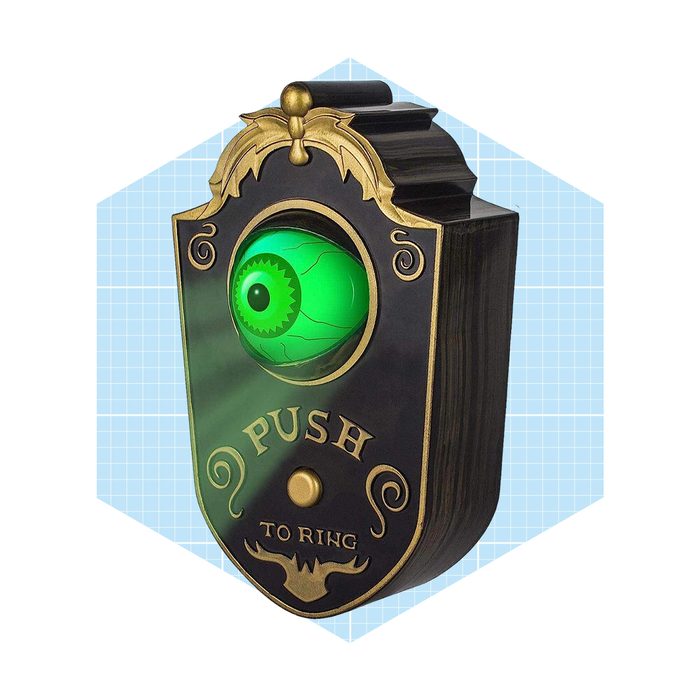 A decorative doorbell features a green eye design, inviting users to 